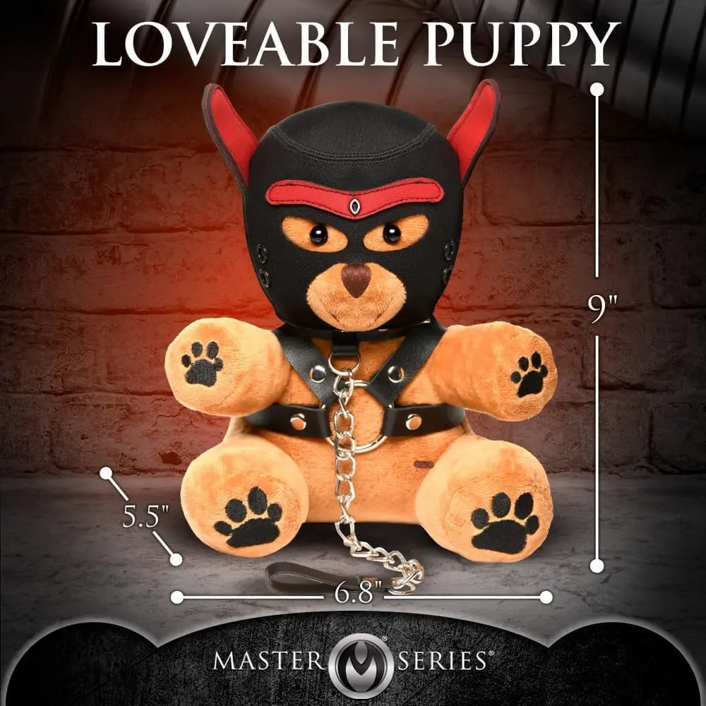 Brown plush puppy wearing black mask and collar.