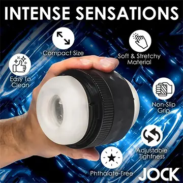 Hand holding a black and white sex toy.