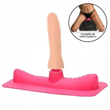 A pink rubber dildo is in the shape of a woman 's breast.