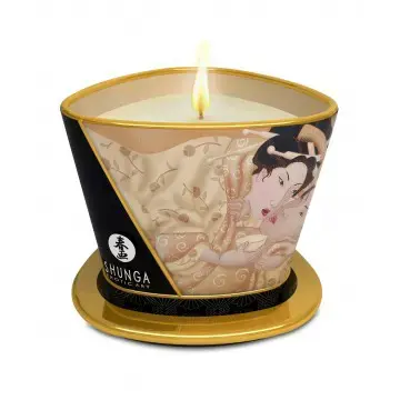 A golden candle with a romantic image.