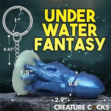Blue octopus tentacle keychain with measurements.