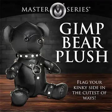 Black leather teddy bear with collar.