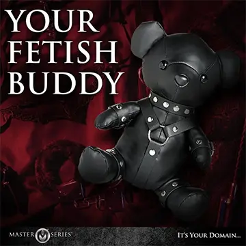 A black leather teddy bear with restraints.