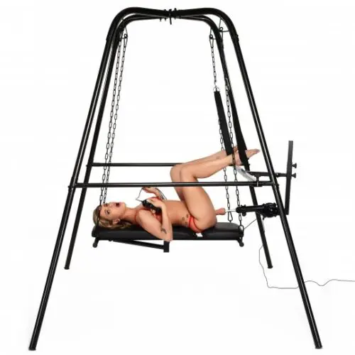 Woman on a black swing set with chains.