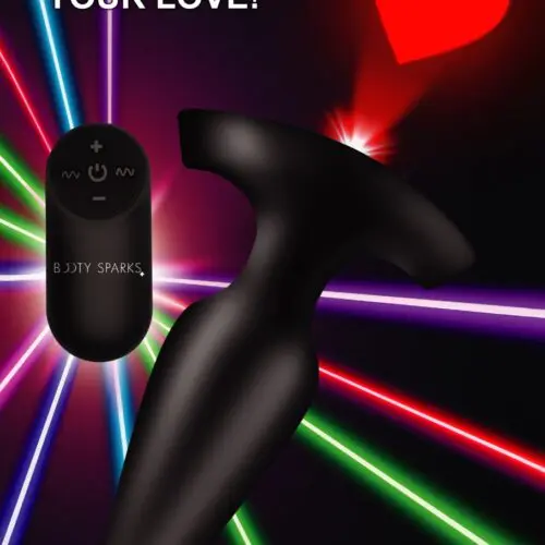 A black and red heart with a remote control