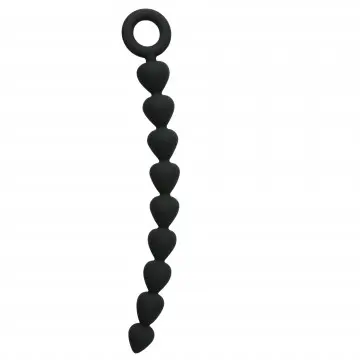A black string of beads hanging from the end.