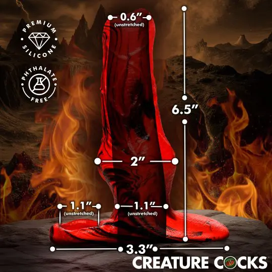 Red glass object with measurements against fiery background.