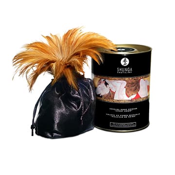 A black velvet bag with a feather boa.