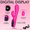 Pink vibrating toy with digital display.