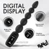 Black silicone toy with digital display and buttons.