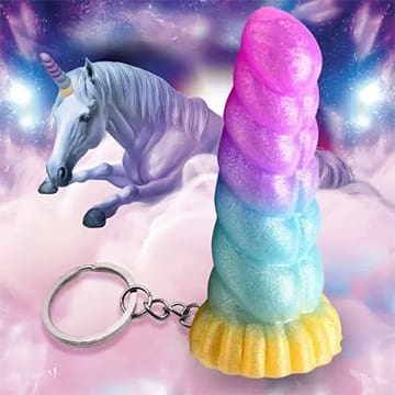 Rainbow unicorn horn keychain with silver chain.