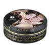 Shunga massage candle with chocolate scent.