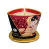 A red candle with a Japanese design.
