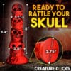 A stack of red and black skulls.