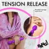 Purple massage wand for muscle tension relief.