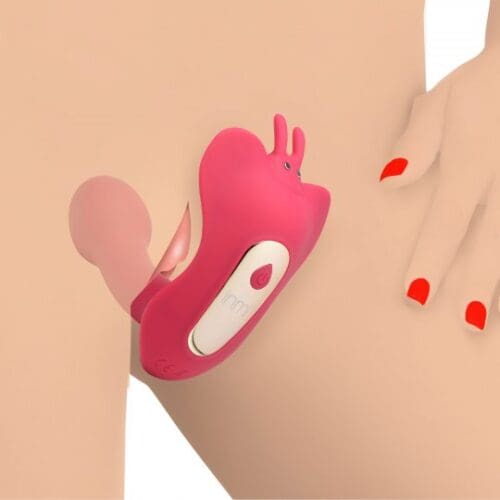Pink intimate toy on a woman's body.