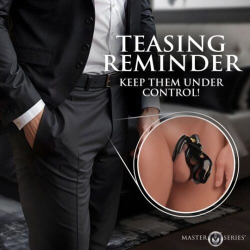 Man in suit with a chastity cage.