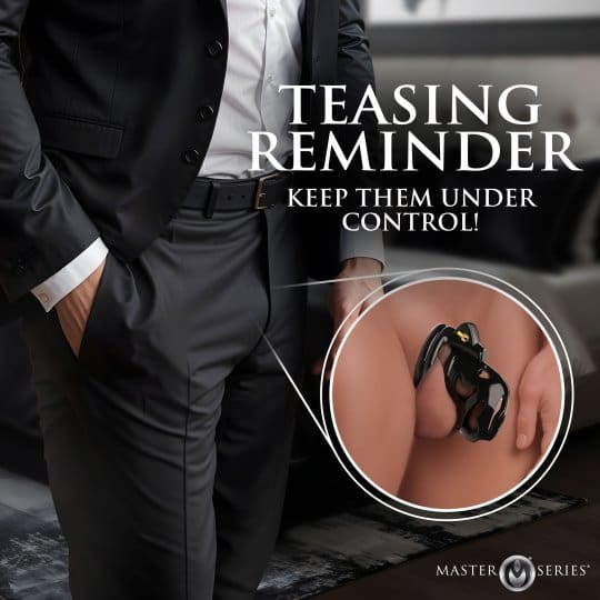 Man in suit with a chastity cage.