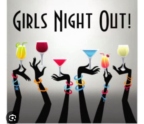 A group of people holding wine glasses in their hands.