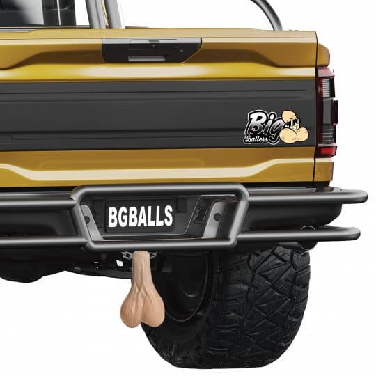 Yellow truck with a bumper sticker.