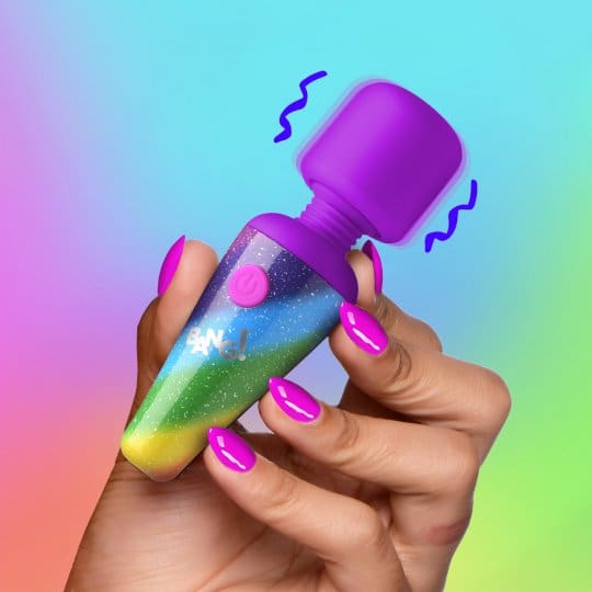 Purple and rainbow vibrator in hand.