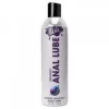 A bottle of anal lube on top of a table.