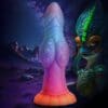 Rainbow alien sex toy with a monster