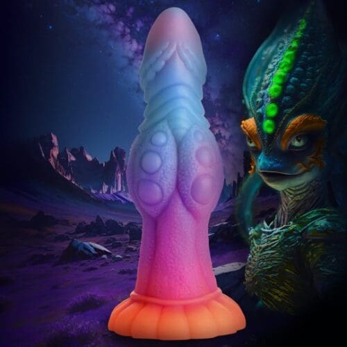 Rainbow alien sex toy with a monster