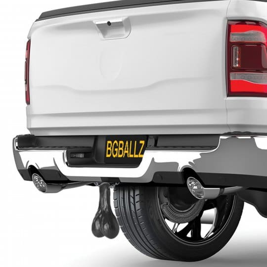 White pickup truck with a funny license plate.