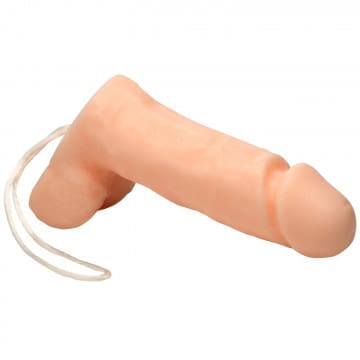 A large dildo with a white string attached to it.