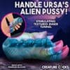 A close up of the handle with text that reads " handle ursa 's alien pussy !"