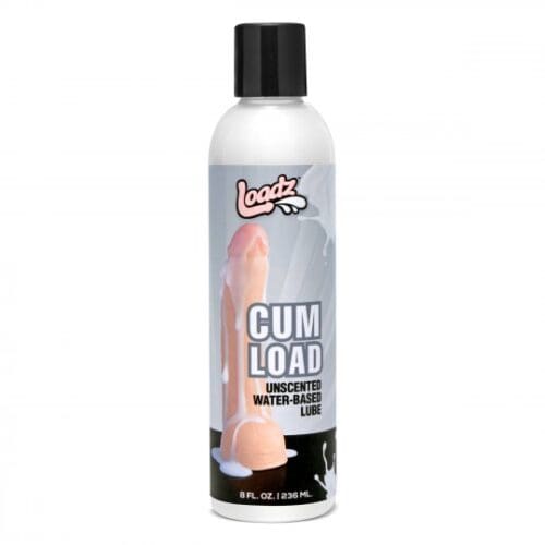A bottle of cum load lubricant on top of a white table.