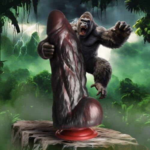 A gorilla is standing on top of a pole.
