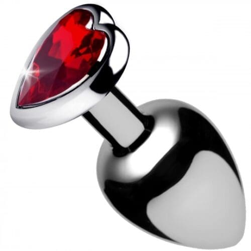 A red heart shaped attachment is shown on the side of a silver object.