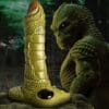 A large dildo is next to a creature.