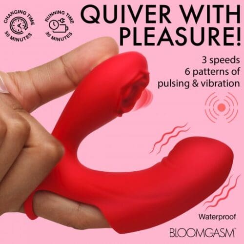 A red vibrator is being held up to show the pattern of its motion.