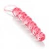 A pink plastic tube with a ring around it.