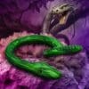 A green snake is sitting on some purple and pink flowers